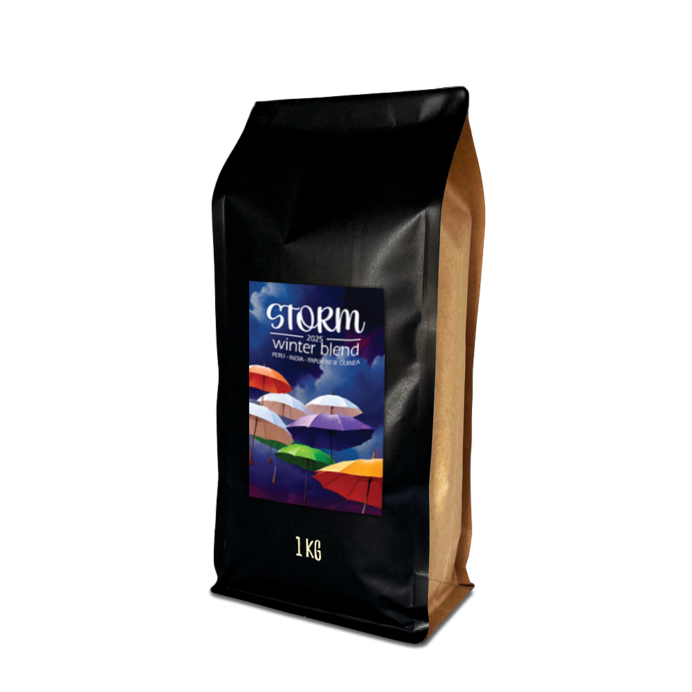 Black coffee bag with colourful label featuring 'Storm 2025' brand with colourful umbrellas