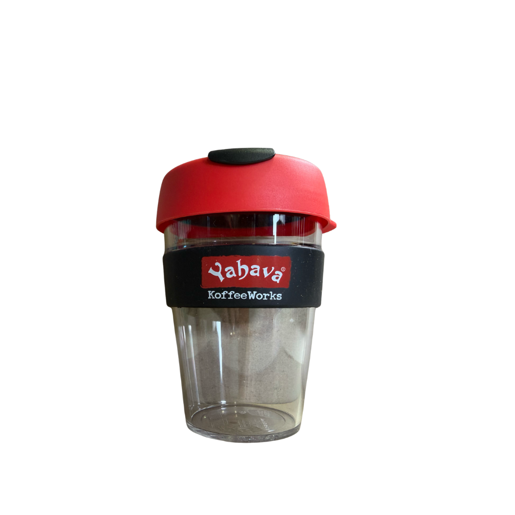A clear plastic travel coffee cup with a red lid and a black band featuring the 'Yahava KoffeeWorks' logo, shown on a plain white background.