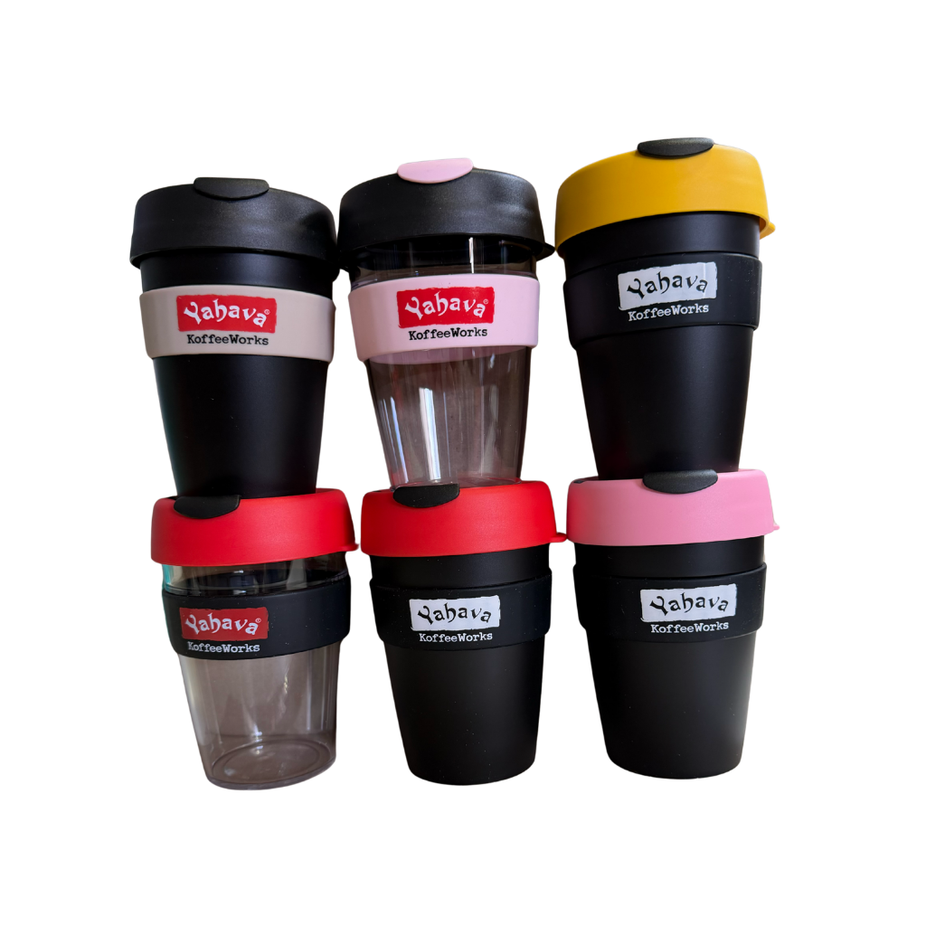 Six reusable coffee cups arranged in a 2x3 grid on a plain white background. The cups are primarily black with various colored lids and bands in yellow, pink, red, and white, featuring the brand name 'Yahava' printed on the labels.
