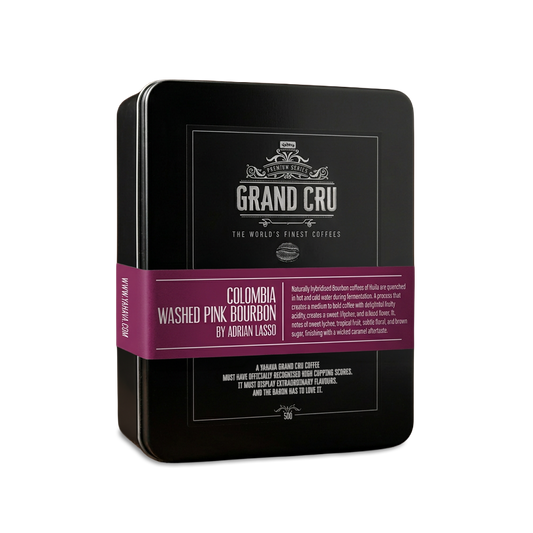 Black metal tin of Yahava Grand Cru Colombia Washed Pink Bourbon coffee with a purple label