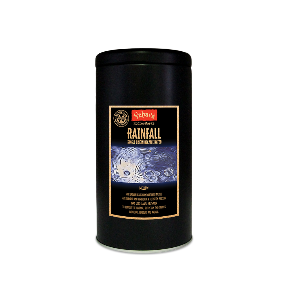 a black 500g tin with yahava signature range coffee label for rainfall (decaf blend) on the tin with raindrops falling into a blue puddle